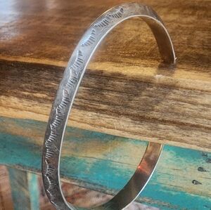 NA sterling silver cuff bracelet.